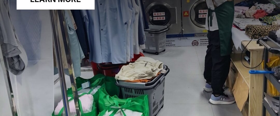 Easy Life Laundry team member sorting clothes at the Shanghai shop